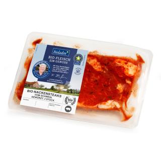 b*Nackensteak vom Schwein, gewürzt